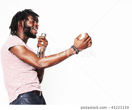 young handsome african american boy singing emotional with micro young handsome african american boy singing emotional with micro 45223139