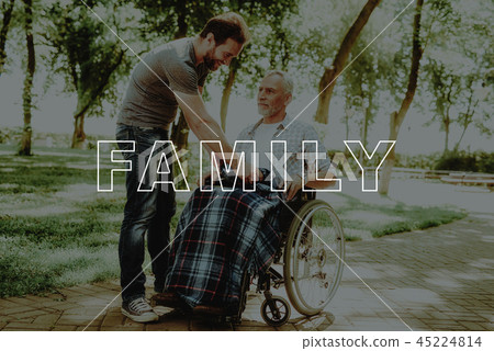 Family Walking in Park. Son Covered Rug Old Man. Family Walking in Park. Son Covered Rug Old Man. 45224814