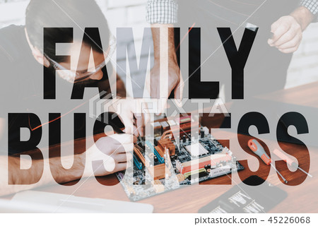 Elderly Master Teaches to Repair Motherboard. 45226068