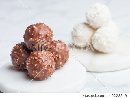 Luxury chocolate candies with hazelnuts Luxury chocolate candies with hazelnuts 45228849