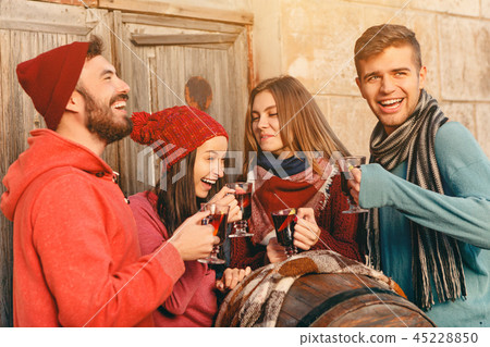 Smiling european men and women during party photoshoot. Smiling european men and women during party photoshoot. 45228850