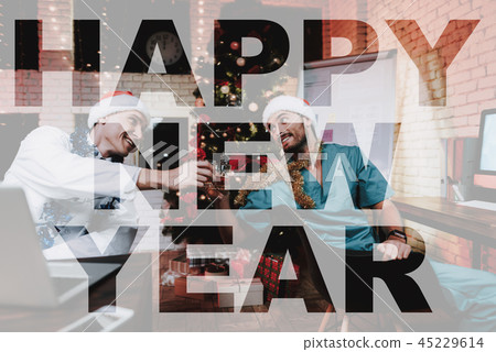 Two Doctors Celebrating New Year's Eve In Office. 45229614