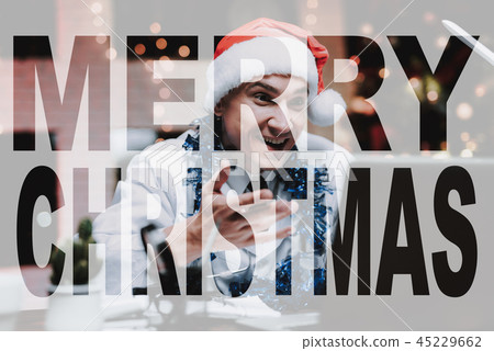 Doctor Is Staring At The Laptop In Christmas Hat. Doctor Is Staring At The Laptop In Christmas Hat. 45229662