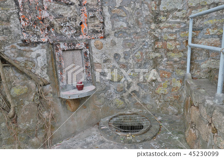 a stone of Deep old water well. a stone of Deep old water well. 45230099