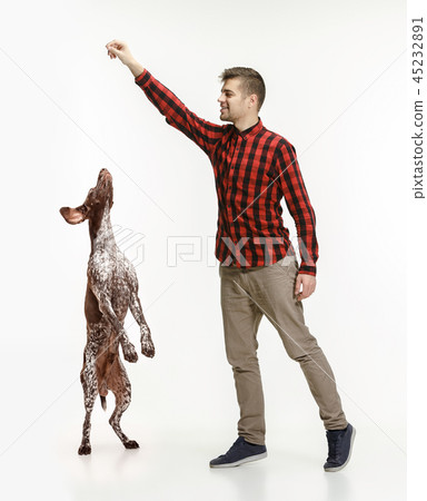 Emotional Portrait of a man and his dog, concept of friendship and care of man and animal 45232891