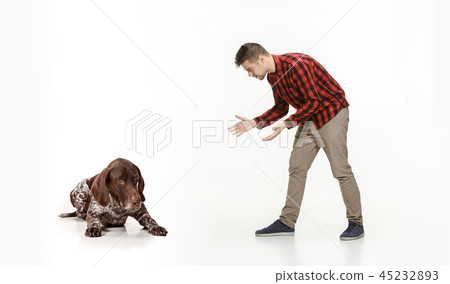Emotional Portrait of a man and his dog, concept of friendship and care of man and animal 45232893