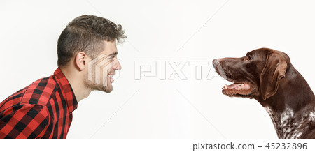 Emotional Portrait of a man and his dog, concept of friendship and care of man and animal Emotional Portrait of a man and his dog, concept of friendship and care of man and animal 45232896