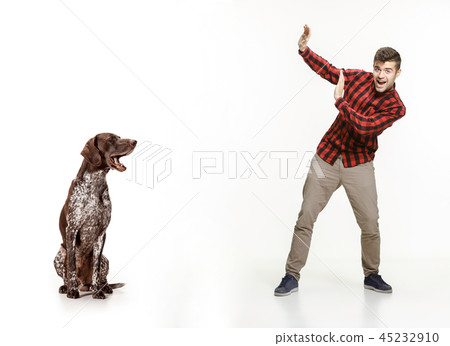 Emotional Portrait of a man and his dog, concept of friendship and care of man and animal Emotional Portrait of a man and his dog, concept of friendship and care of man and animal 45232910