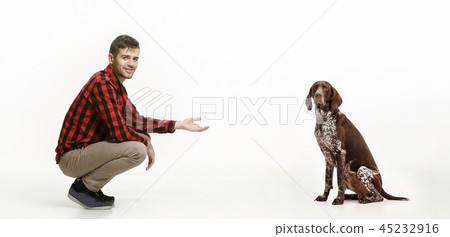 Emotional Portrait of a man and his dog, concept of friendship and care of man and animal Emotional Portrait of a man and his dog, concept of friendship and care of man and animal 45232916