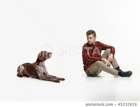 Emotional Portrait of a man and his dog, concept of friendship and care of man and animal Emotional Portrait of a man and his dog, concept of friendship and care of man and animal 45232919