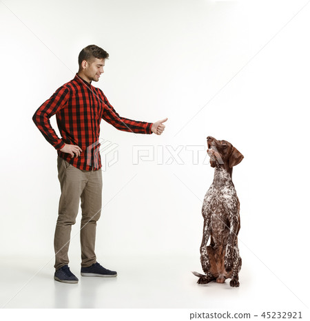 Emotional Portrait of a man and his dog, concept of friendship and care of man and animal Emotional Portrait of a man and his dog, concept of friendship and care of man and animal 45232921