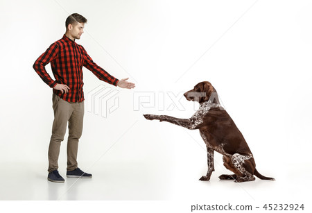 Emotional Portrait of a man and his dog, concept of friendship and care of man and animal Emotional Portrait of a man and his dog, concept of friendship and care of man and animal 45232924