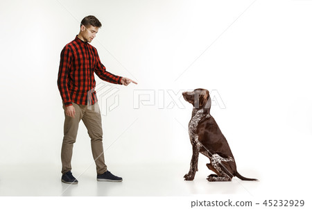 Emotional Portrait of a man and his dog, concept of friendship and care of man and animal Emotional Portrait of a man and his dog, concept of friendship and care of man and animal 45232929