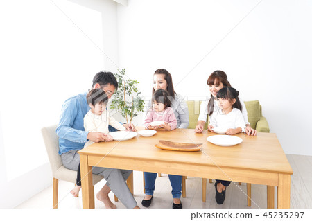 Parent and child doing home party Parent and child doing home party 45235297