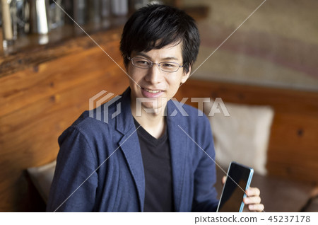 Casual men working in a cafe Casual men working in a cafe 45237178