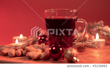 Glass of hot and spiced Christmas punch mulled wine Glass of hot and spiced Christmas punch mulled wine 45238062