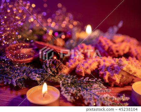 Typical Christmas decoration with cookies and candles 45238104
