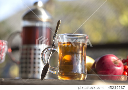 Autumn still life with a cup of tea Autumn still life with a cup of tea 45239287