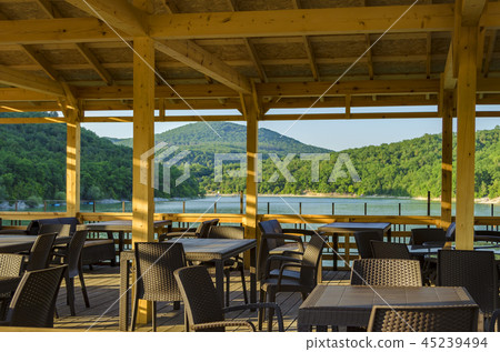 Summer cafe on the lake shore in the mountains 45239494