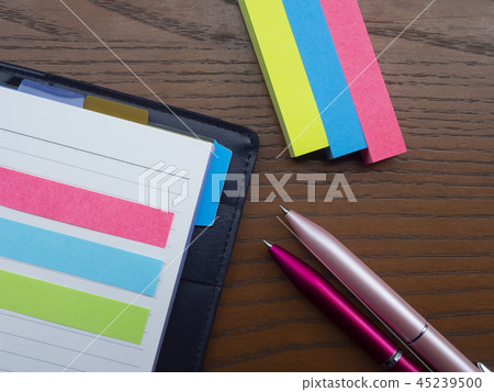 Business image · notebook · sticky note · female 45239500