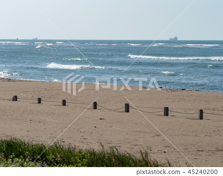 fences on sand beach 45240200