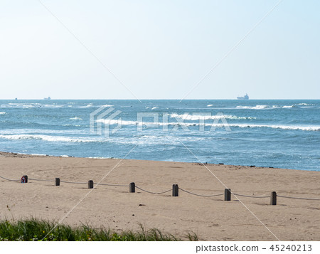 fences on sand beach 45240213