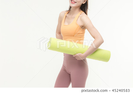Korean woman with yoga mat 45240583