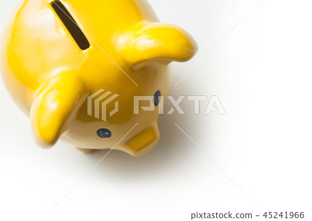 closeup of yellow piggy bank on white background closeup of yellow piggy bank on white background 45241966