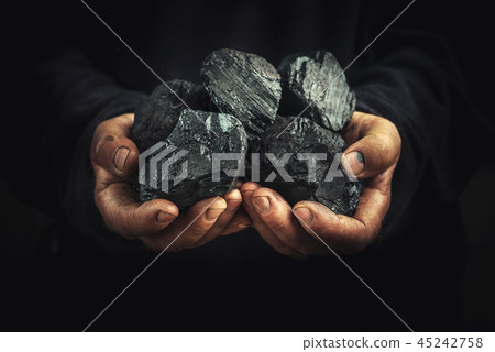 black coal in the hands, heavy industry, heating black coal in the hands, heavy industry, heating 45242758