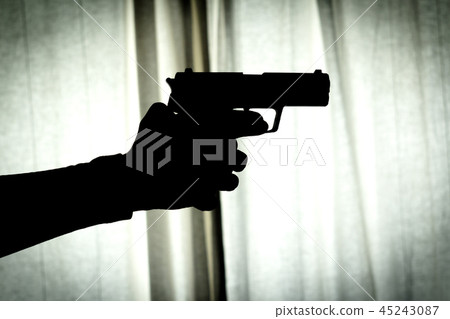 Firearm in silhouette Firearm in silhouette 45243087