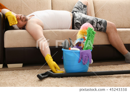 The man was left alone at home tired The man was left alone at home tired 45243338