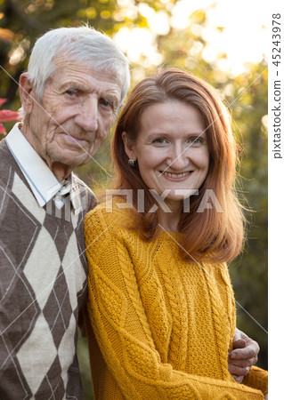 happy family - grandfather and granddaughter 45243978