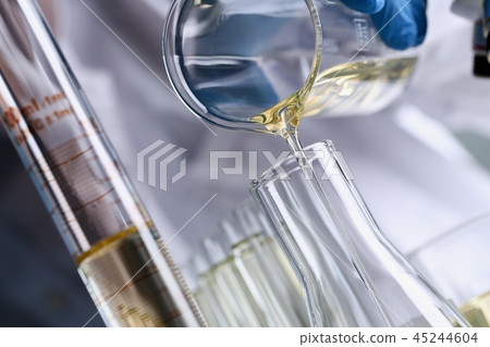 Yellow liquid spilled petrol additive innovative supply 45244604