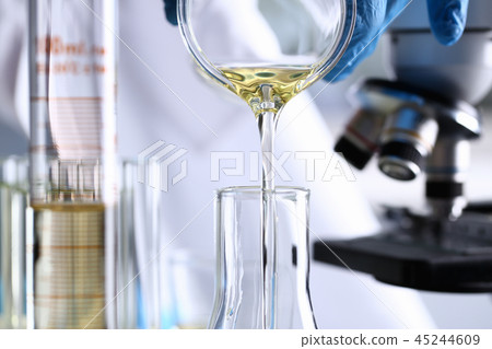 Yellow liquid spilled petrol additive innovative supply Yellow liquid spilled petrol additive innovative supply 45244609