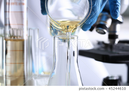 Yellow liquid spilled petrol additive innovative supply Yellow liquid spilled petrol additive innovative supply 45244610