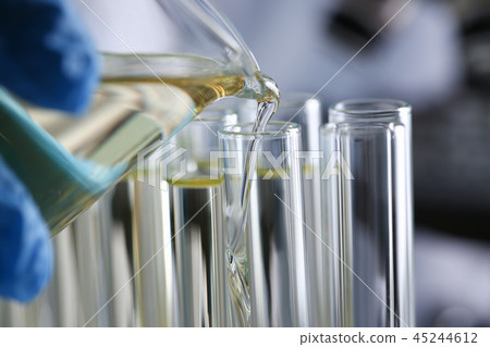 Yellow liquid spilled petrol additive innovative supply 45244612