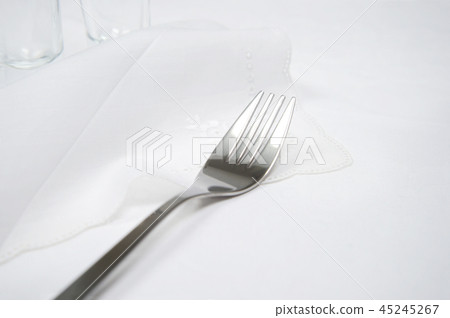 silver fork on luxury white tablecloth food dinner silver fork on luxury white tablecloth food dinner 45245267
