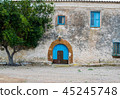 Blue wooden door in the old Spanish rural house 45245748