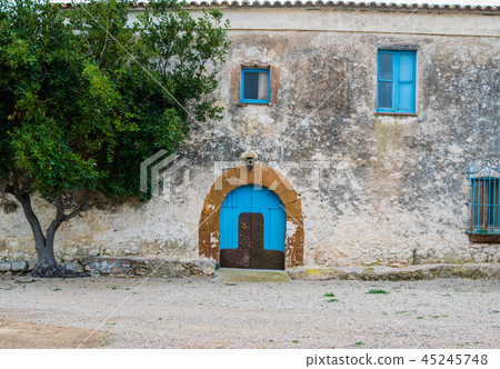 Blue wooden door in the old Spanish rural house Blue wooden door in the old Spanish rural house 45245748