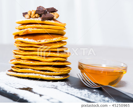 Pancakes with honey and chocolate Pancakes with honey and chocolate 45250965