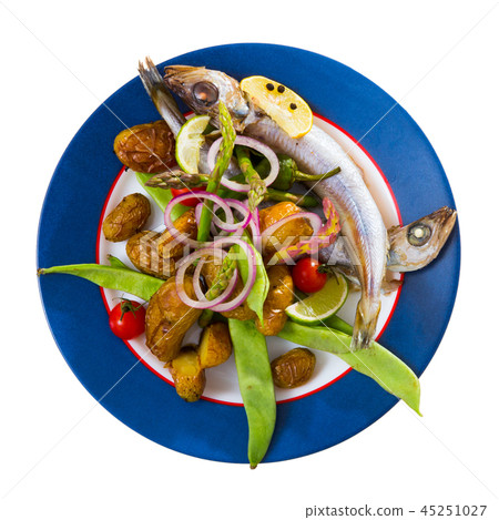 Top view of whiting with baked potatoes, asparagus, tomatoes, snow peas Top view of whiting with baked potatoes, asparagus, tomatoes, snow peas 45251027