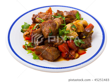 Meat baked with mushrooms and vegetables Meat baked with mushrooms and vegetables 45251483