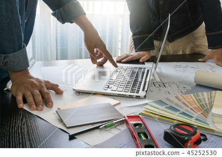 architect and engineer discussing during a meeting architect and engineer discussing during a meeting 45252530