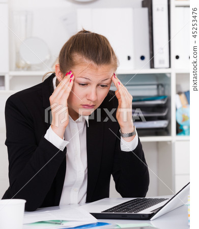 Office manager woman is having complicated issue with project Office manager woman is having complicated issue with project 45253476