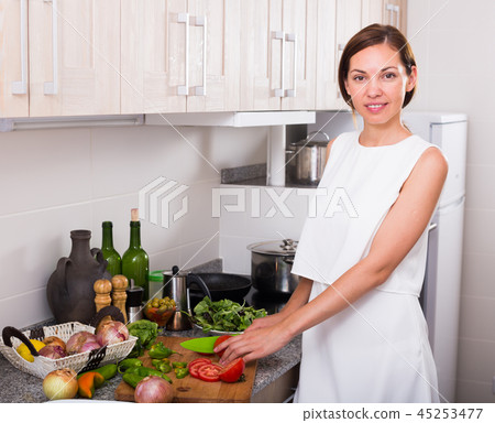 woman serving salad 45253477