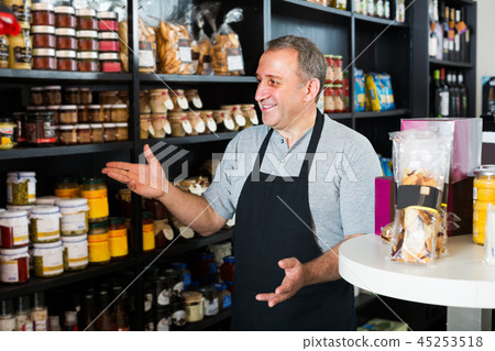man standing near counter 45253518