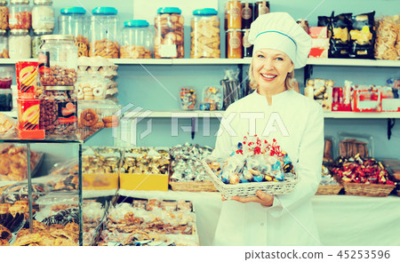 Women selling nuts and pastry 45253596