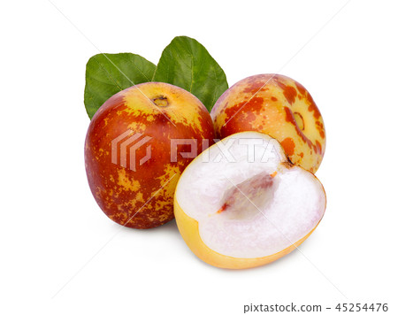 chinese jujubes with green leaf isolated on white  45254476