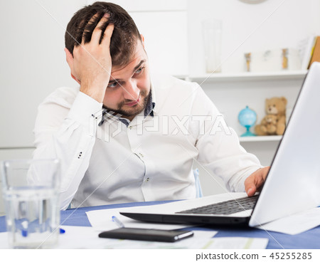 Man having problem in office Man having problem in office 45255285