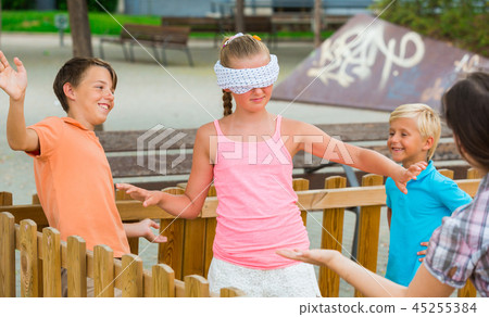 Girls and boys are playing in blindfolders 45255384